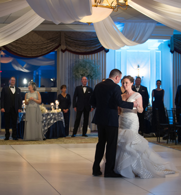 Bride and Groom sharing a dance at their wedding at the Event Venue at Wolferts Roost Country Club in Albany, New York